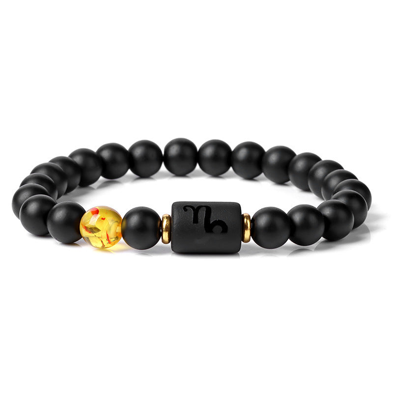 A powerful line-up of all zodiac signs in deep black and gold tones.