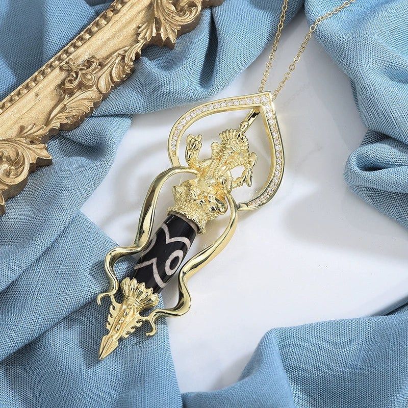 Dorje Elephant-Head Protection Pendant | Nine-Eye Dzi Bead Gold