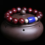 High Gloss Nepal Phoenix Eye Bodhi Bracelet with Royal Blue Lapis Lazuli Accents(2)