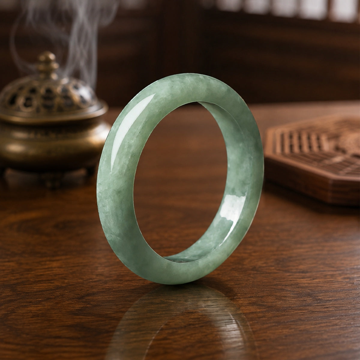 Natural green jadeite ring for Taoist wealth attraction and daily protection.