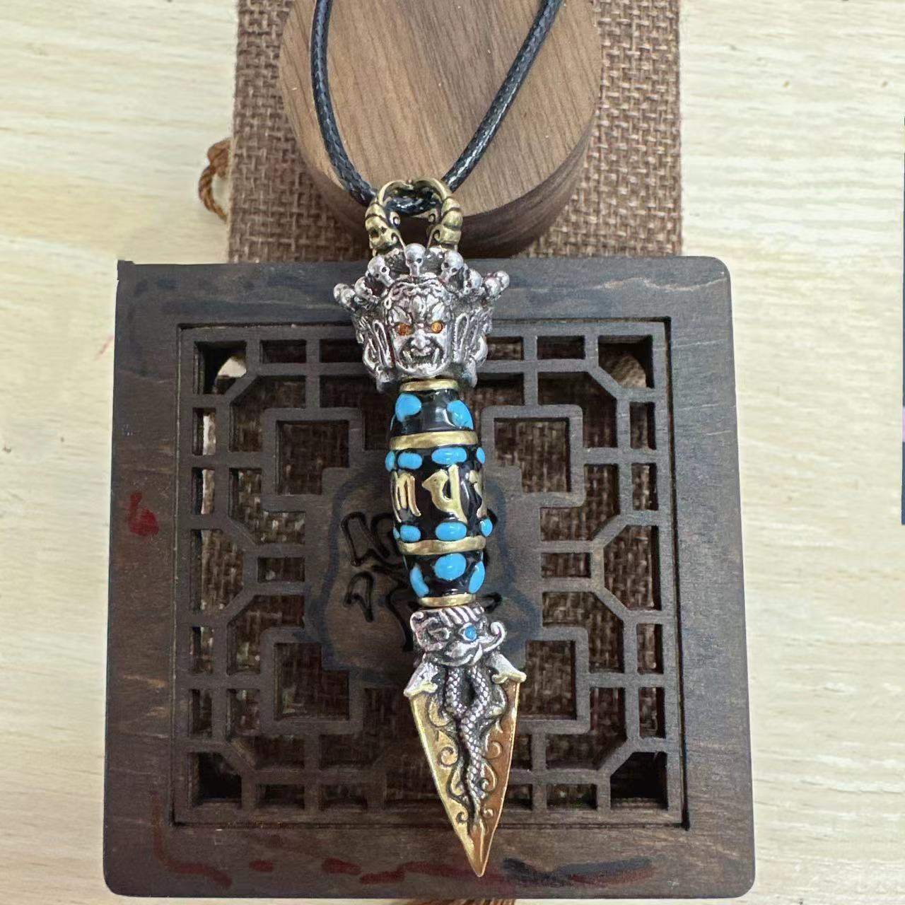 Dorje Elephant-Head Protection Pendant | Nine-Eye Dzi Bead Gold