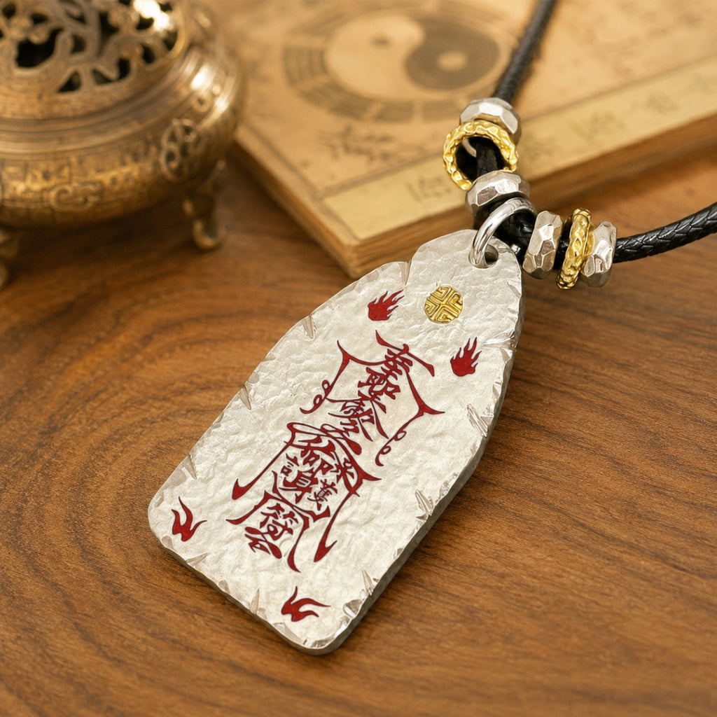 Hand-hammered 925 silver Taoist dual-sided protection talisman pendant with cinnabar front talisman details and black cord