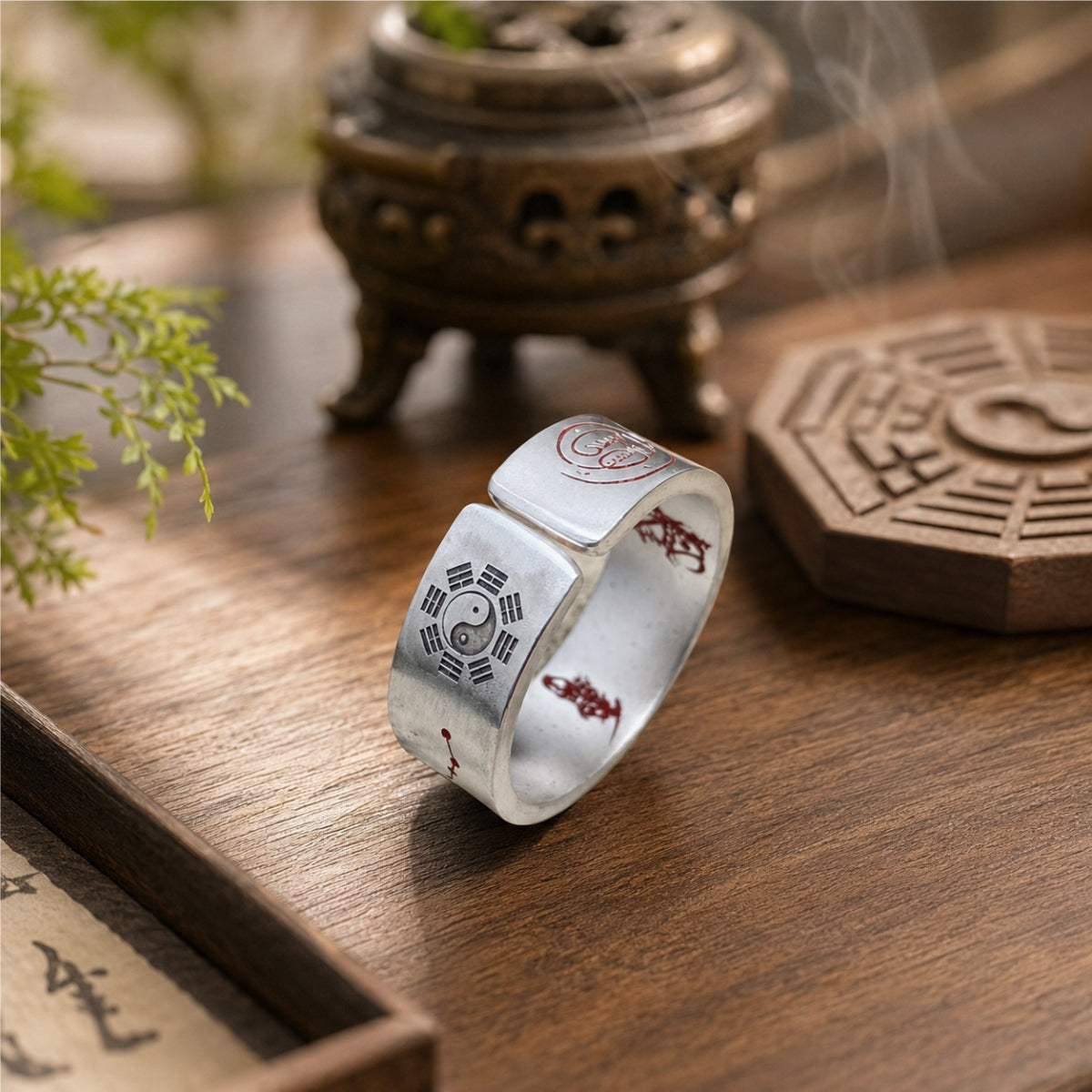 Taoist negative energy protection ring featuring a Yin-Yang symbol, protective talisman details, and an adjustable open-band design.