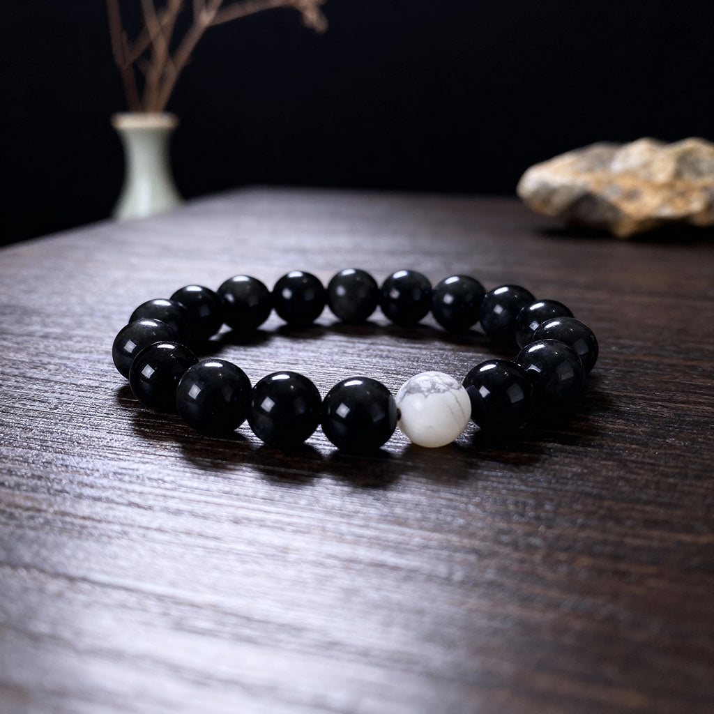 Taoist KaiGuang his black obsidian yin yang couple bracelet — natural bead texture close up kaiguang love protection