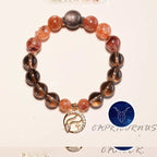 Capricorn zodiac strawberry quartz and smoky quartz crystal healing bracelet with black metal bead and gold goat constellation charm Taoist KaiGuang manifestation spiritual jewelry