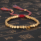 copper bead bracelet women taoist kaiguang wealth love aura gold beads red rope calligraphy background