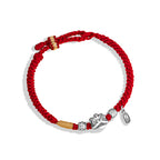  Red and gold braided cord love protection bracelet with silver lion head charm rune beads and oval tag on white background Taoist KaiGuang couple jewelry
