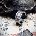 Vertical shot of the Demon-Slayer Talisman engraved on the ring, designed to shatter evil spirits and clear negativity on contact.
