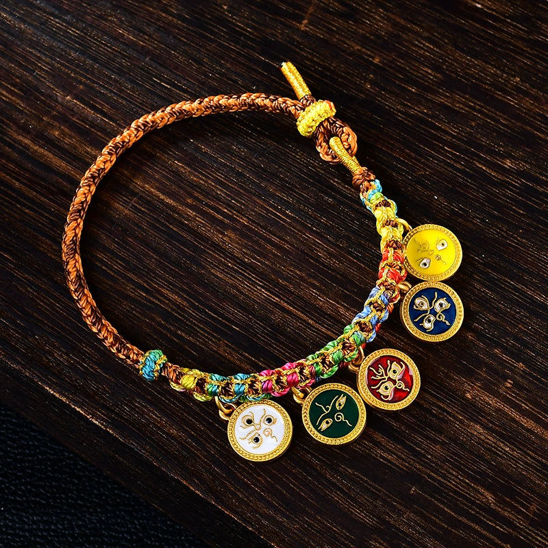 Five Gods of Wealth fortune bracelet hanging gold enamel charms five-color braided rope dark wood background