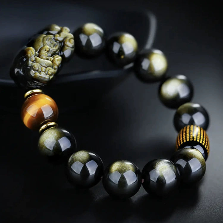 Gold obsidian Pixiu wealth bracelet with tiger eye bead and gold rune barrel on black silk