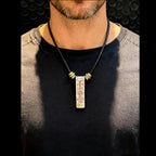 Lifestyle shot of the pendant positioned over the heart, acting as a core energy center guardian for 24-hour protection.