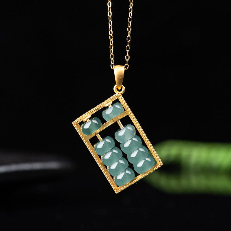 jade abacus pendant green nature background gold frame taoist kaiguang fortune turn wealth