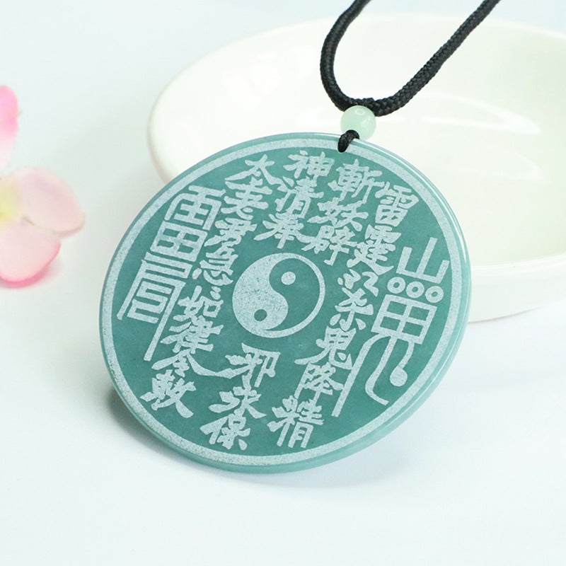 jade Shan-Gui coin pendant front view taoist yin yang symbol kaiguang amulet evil ward white background