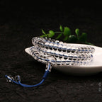 Full view of consecrated 108 clear quartz prayer beads with "THREE YEARS" inscription.