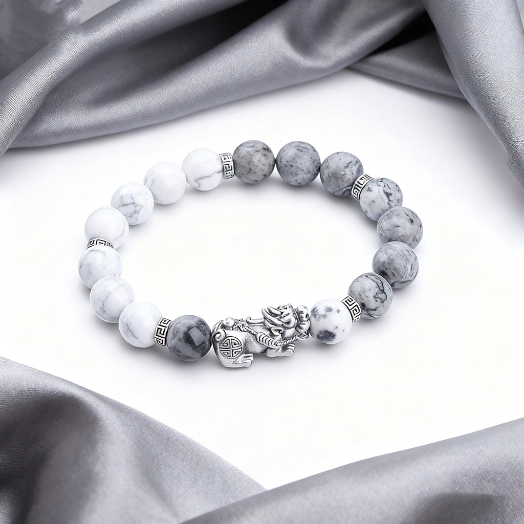 map stone pixiu bracelet closeup grey background taoist kaiguang career fortune wealth attraction jewelry