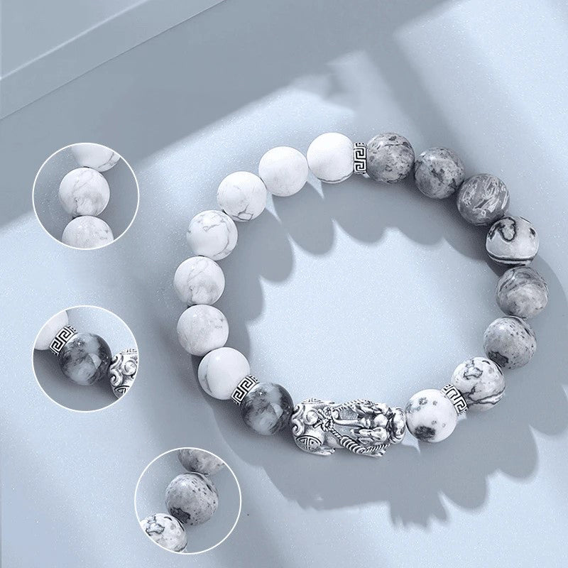 natural map stone pixiu bracelet wearing display taoist kaiguang wealth fortune career success light background