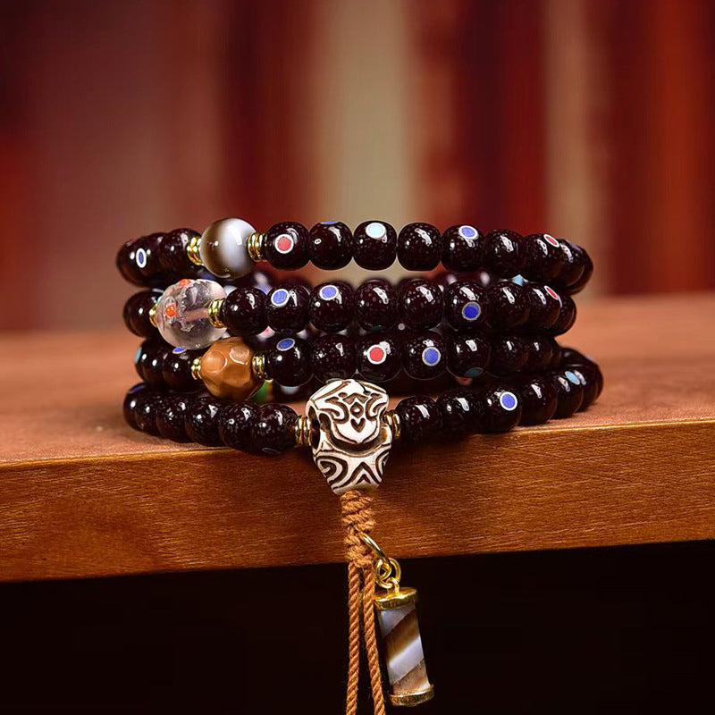 Multi-wrap design featuring turquoise and cinnabar for aura defense.