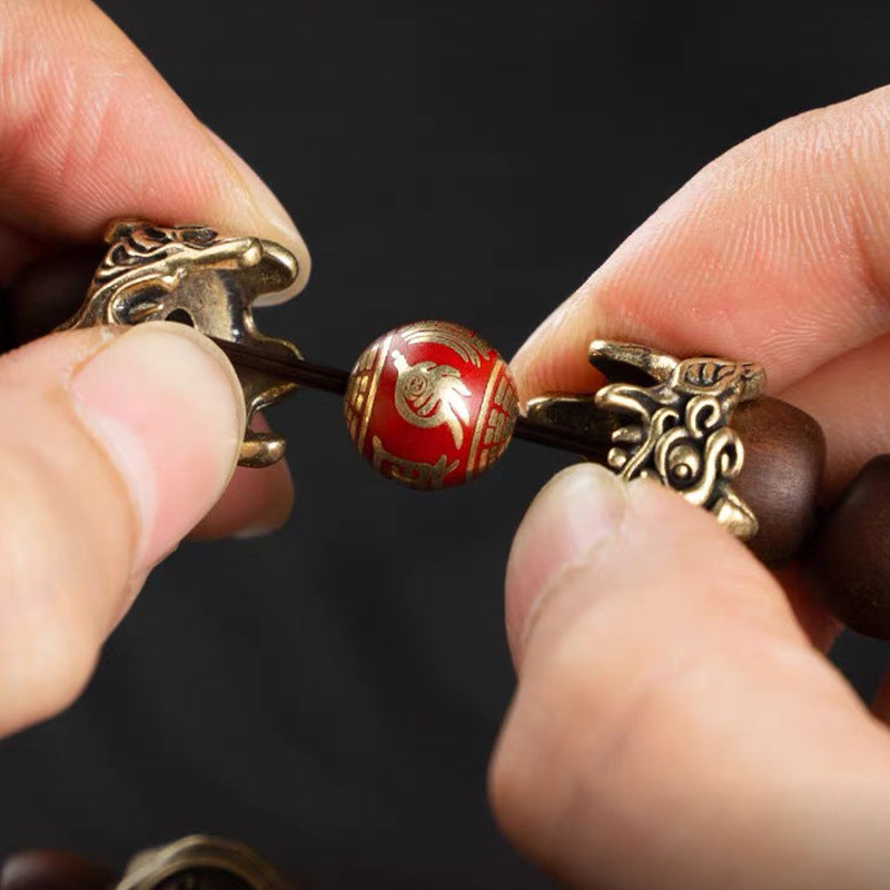pixiu bracelet inner bead close up thunder wood kaiguang pure yang protection detail taoist