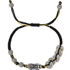 Pixiu five coin fortune seal bracelet full circle view on white background black yellow braided cord with silver coin pattern beads and ancient coins