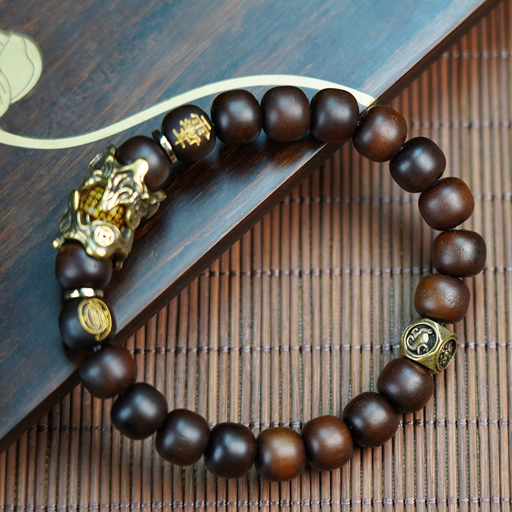 pixiu thunder wood bracelet dark wood beads on wooden tray kaiguang wealth protection