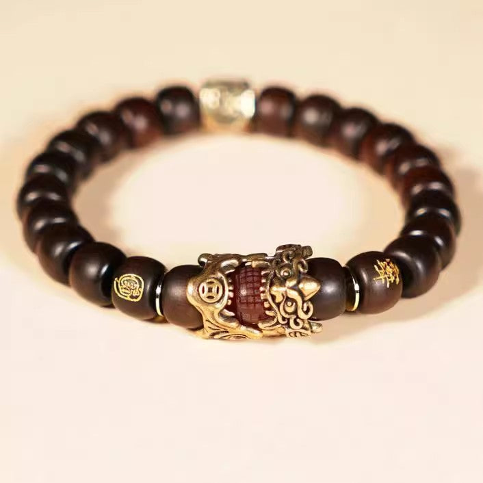 pixiu thunder wood bracelet flat lay natural wood beads pure yang protection kaiguang ritual
