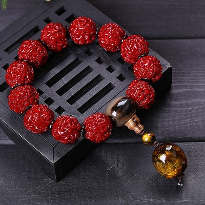 Rudraksha aura shield bracelet with amber crystal pendant displayed on dark wood lattice Taoist KaiGuang spiritual protection bracelet