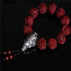 Nepal Rudraksha evil ward bracelet with silver Monkey King charm and red accent beads Taoist KaiGuang consecrated protection jewelry