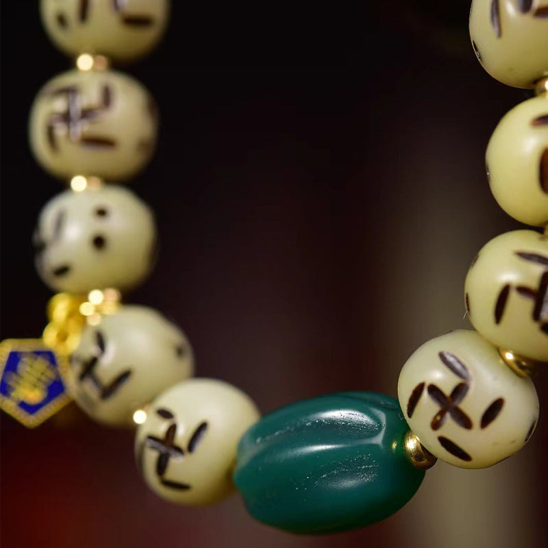Macro detail of the ancient Taoist swastika symbol carved on warm bone beads, representing the eternal movement of the sun and life's cycle.