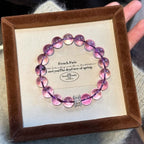 Close-up of S925 silver bow and 10mm amethyst beads