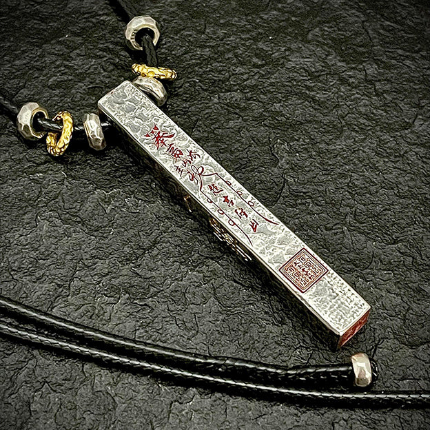 Side perspective of the solid 925 sterling silver amulet, showcasing its six faces of consolidated, multi-layered spiritual protection.