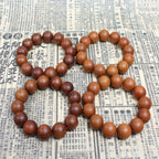 High-density dark aged wood beads for spiritual defense and protection.