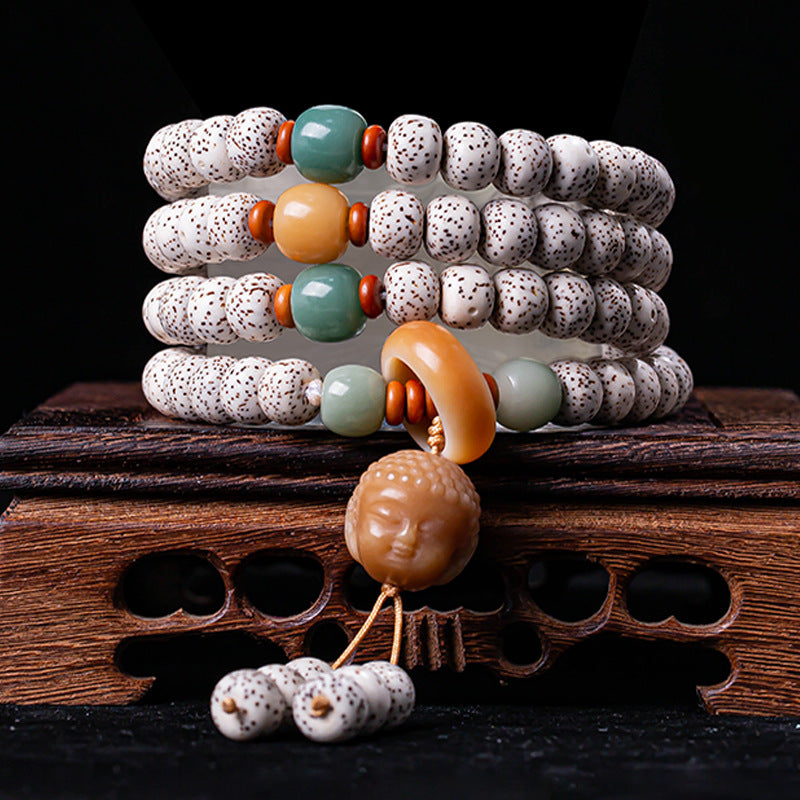 Star Moon Bodhi mala with Laughing Buddha for abundance and cosmic connection.