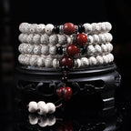 Star moon bodhi 108 bead meditation mala four wrap with red agate obsidian and silver spacer beads on black lacquer stand mirror reflection Taoist KaiGuang spiritual tool cosmic alignment
