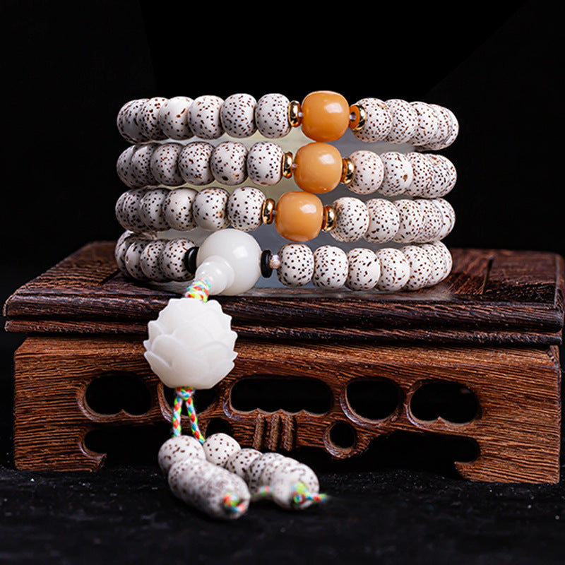 Star moon bodhi 108 bead meditation mala four wrap with yellow beeswax beads white jade lotus pendant colorful tassel on carved rosewood stand Taoist KaiGuang cosmic alignment mindfulness tool