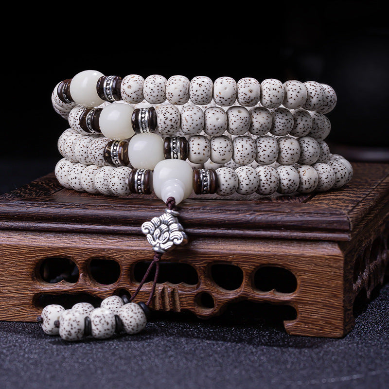 Star moon bodhi 108 bead meditation mala four wrap with white jade beads black sandalwood silver flower spacers and silver lotus pendant on rosewood stand Taoist KaiGuang mindful stillness