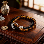 taoist kaiguang black obsidian tiger eye double layer bracelet detail view protection fortune bracelet