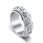  Silver Taoist KaiGuang spinner ring close up showing Chinese Taoist rune characters engraved on rotatable band white background