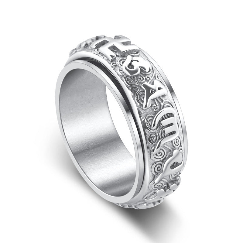 Silver Taoist KaiGuang spinner ring close up showing Chinese Taoist rune characters engraved on rotatable band white background