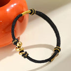 Taoist KaiGuang Snake Zodiac Black Cord Bracelet Gold Snake Charm Close Up Spiritual Protection