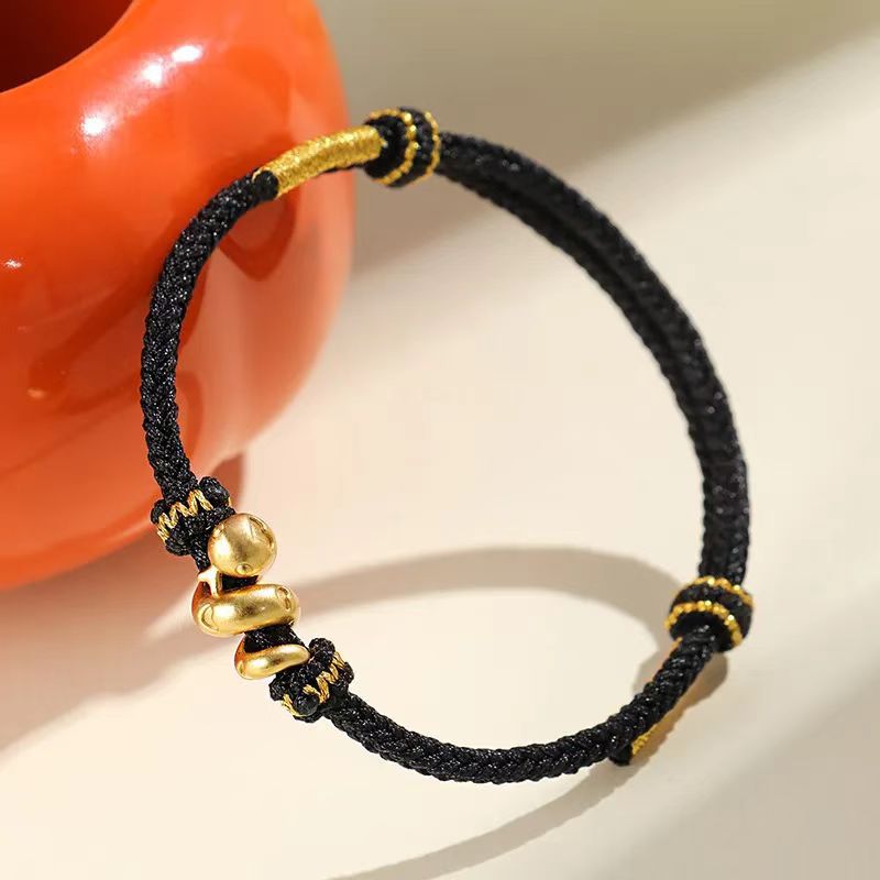 Taoist KaiGuang Snake Zodiac Black Cord Bracelet Gold Snake Charm Close Up Spiritual Protection
