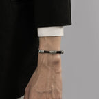 Taoist KaiGuang wealth guardian bracelet worn on man wrist with suit sleeve sterling silver dual Pixiu lock bracelet business lifestyle