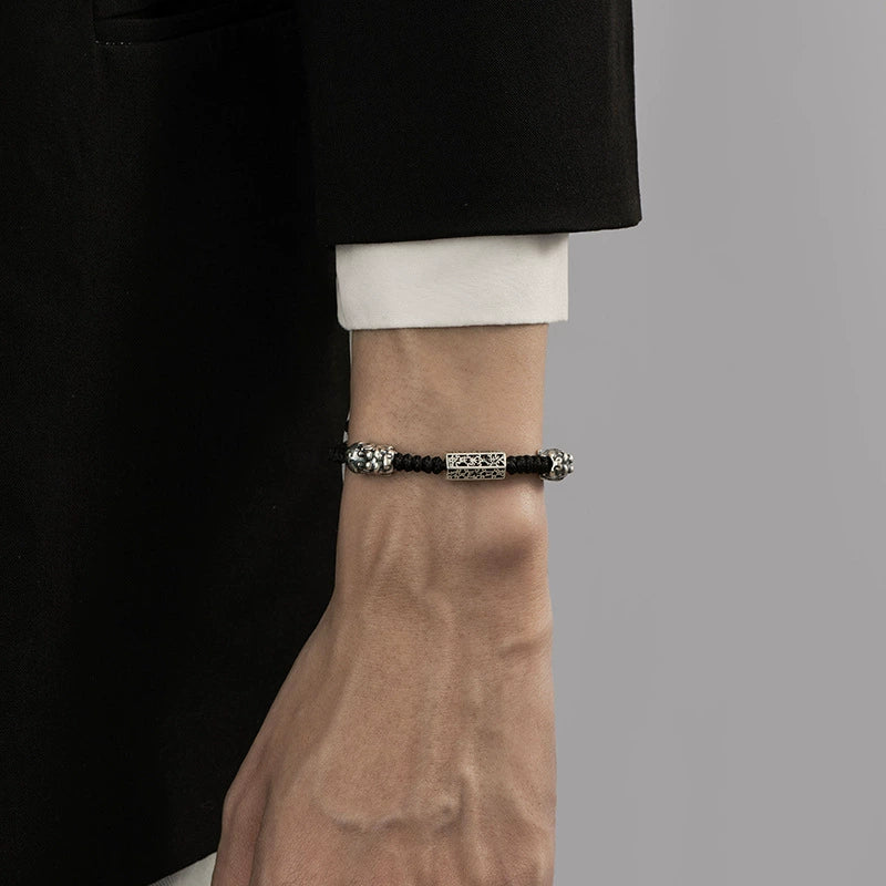 Taoist KaiGuang wealth guardian bracelet worn on man wrist with suit sleeve sterling silver dual Pixiu lock bracelet business lifestyle