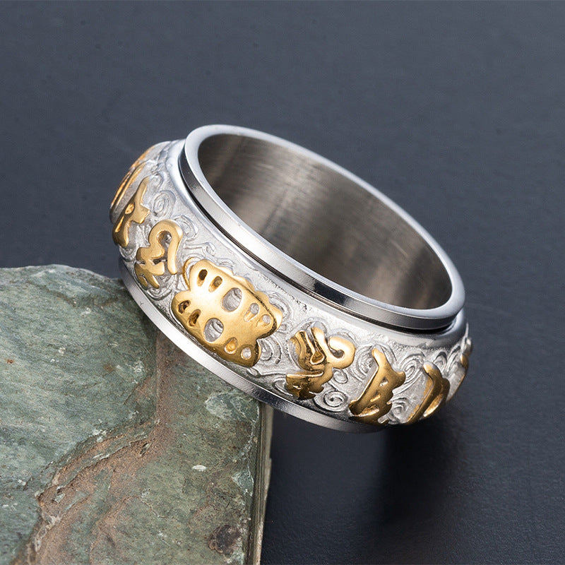  Close up of gold silver Taoist spinner ring rune engravings consecrated by Longhu Mountain priests