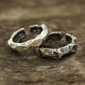 Taoist sun rune silver ring close up gold solar symbol with cinnabar KaiGuang consecration on stone