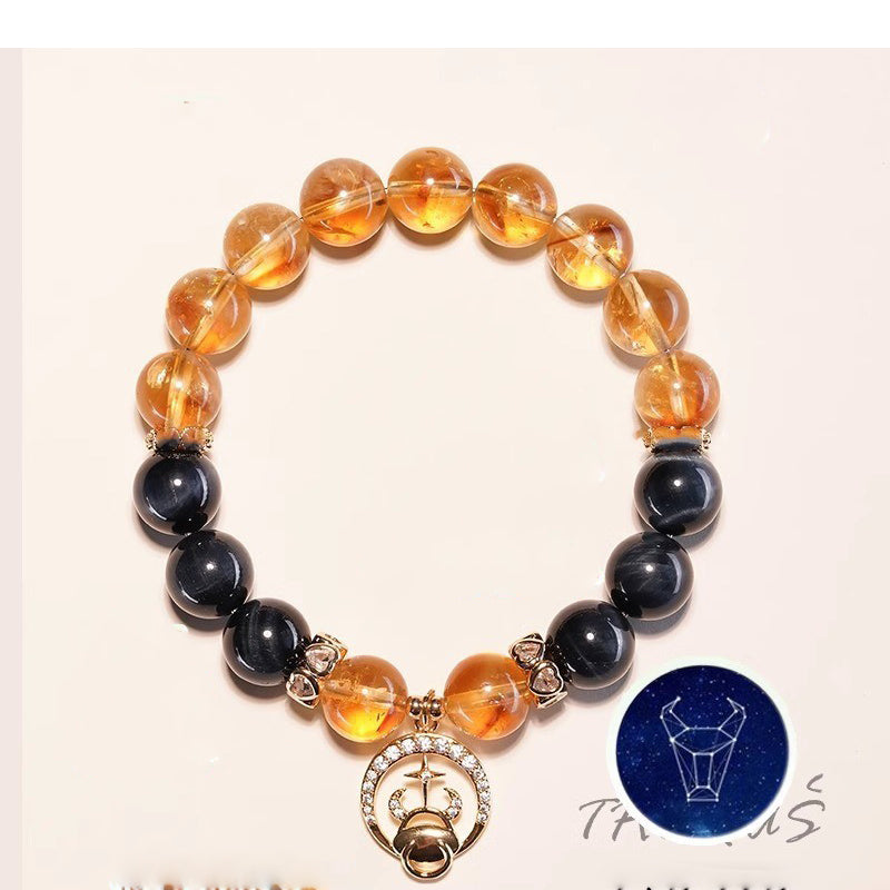  Taurus zodiac citrine and blue tigers eye crystal healing bracelet with gold constellation charm Taoist KaiGuang abundance manifestation spiritual jewelry