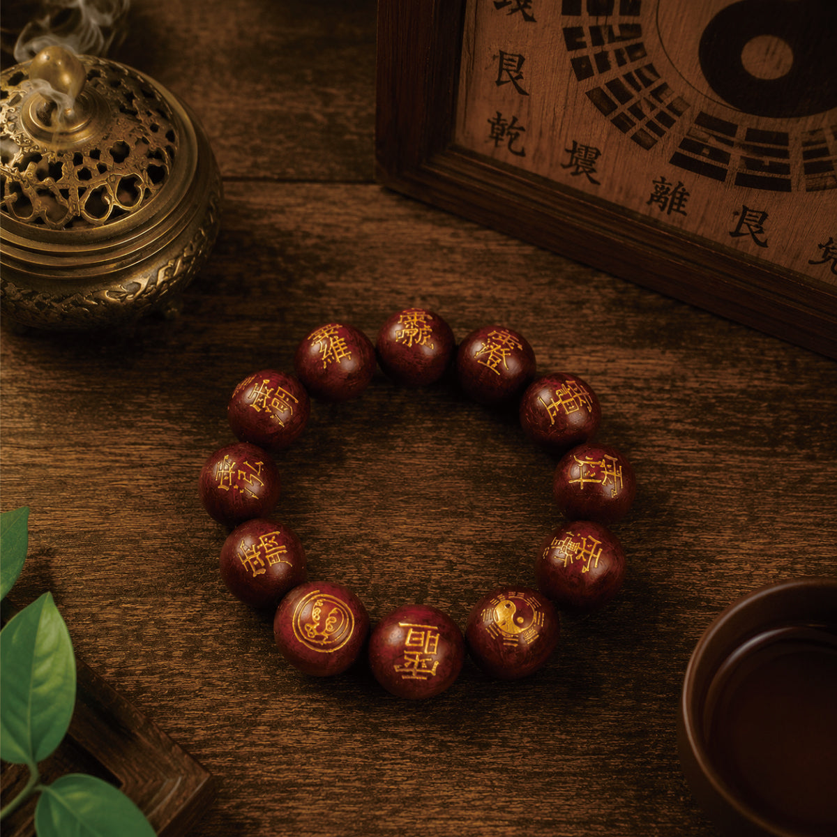 Consecrated thunderstruck jujube wood energy shield bracelet beside Taoist bronze incense burner and bagua board