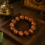 Thunderstruck jujube wood protection bracelet overhead view on dark bamboo tray with hand-engraved nine character mantra beads bronze incense burner rising smoke bagua board background Longhu Mountain KaiGuang energy shield
