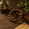 Thunderstruck jujube wood protection bracelet 14mm large round beads with natural lightning scorch marks laid on dark carved wooden tray bronze incense burner smoke green leaves Taoist talisman paper pure Yang energy ward off evil