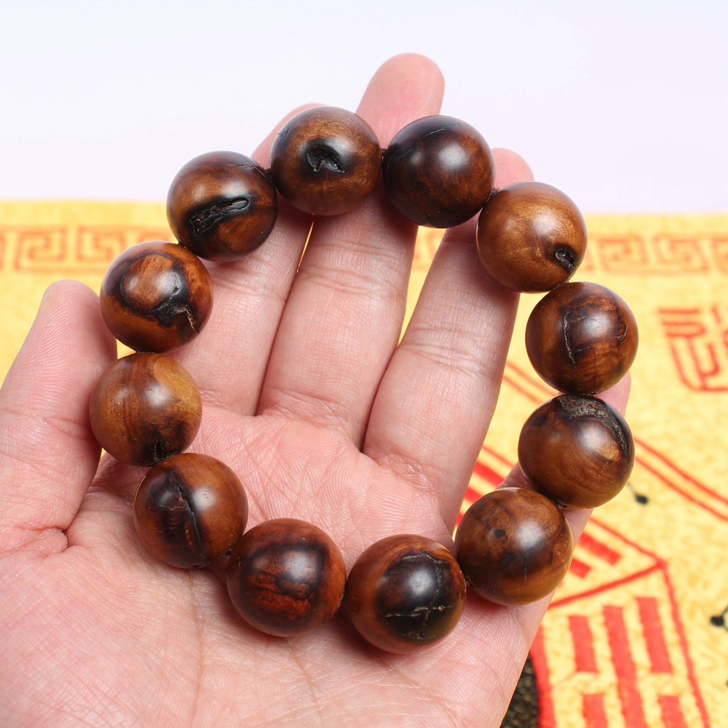 Thunderstruck wood bracelet for travel protection and warding off malevolent forces at night.
