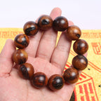 Thunderstruck wood bracelet for travel protection and warding off malevolent forces at night.